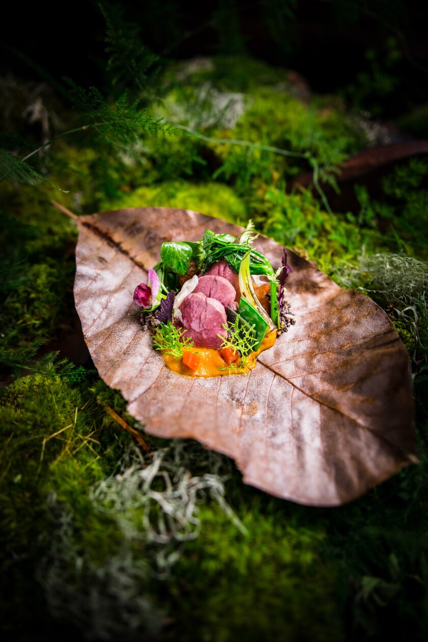 A dish served on a leaf and moss at SingleThread, a Michelin three-star restaurant in Healdsburg, California.