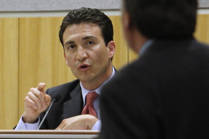 Former state Sen. Michael Rubio ( D-Shafter), left, during a hearing before he resigned.