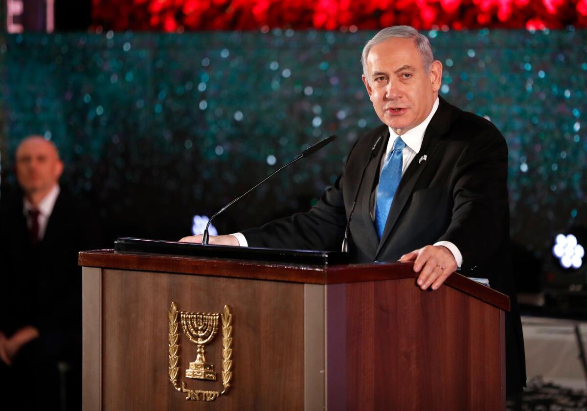 Israeli Prime Minister Benjamin Netanyahu speaks Jan. 23 at a ceremony in Jerusalem.