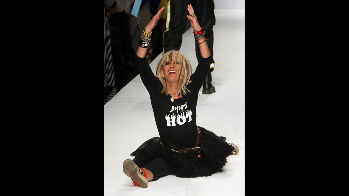 After her signature cartwheel, fashion designer Betsey Johnson does a split at the end of her runway show at L.A. Fashion Week at LA Live in March.