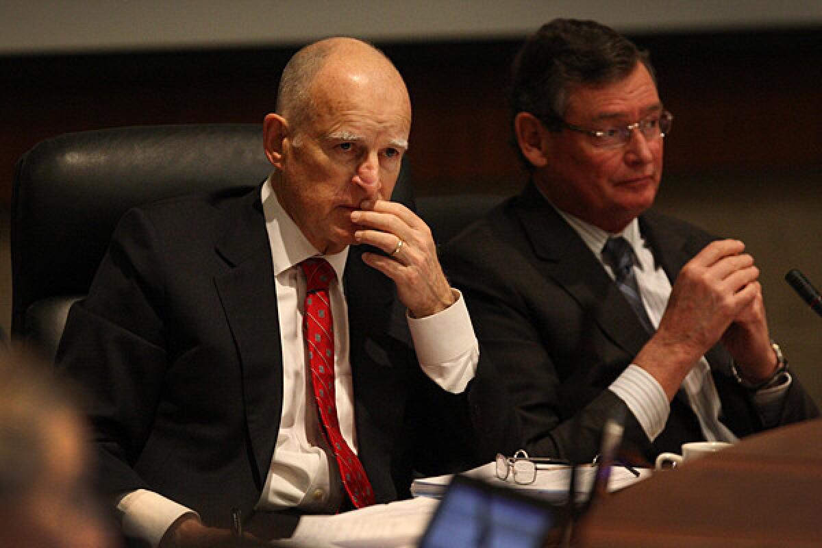Gov. Jerry Brown and Chancellor Timothy White at a Cal State trustees meeting last year.