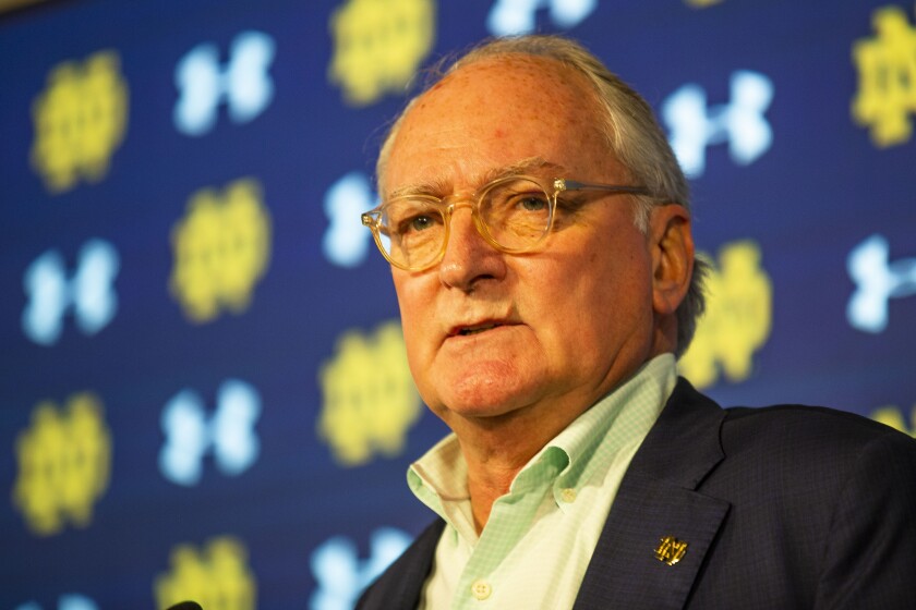 Notre Dame athletic director Jack Swarbrick answers questions regarding NCAA college football head coach Brian Kelly's resignation, Tuesday, Nov. 30, 2021, at Notre Dame Stadium in South Bend, Ind. (Michael Caterina/South Bend Tribune via AP)