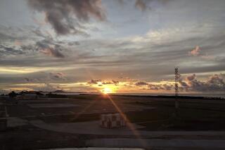 FILE - The sun sets over the runway at the Chuuk Airport in Weno, Federated States of Micronesia, on OCT. 28, 2017. In mid-July, 2022, Micronesia likely became the final nation in the world with a population of more than 100,000 to experience an outbreak of the disease, after avoiding it for two-and-a-half years thanks to its geographic isolation and border controls. (AP Photo/Nicole Evatt, File)