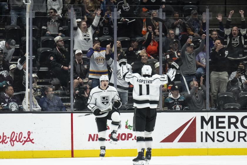 Kings left wing Kevin Fiala celebrates with center Anze Kopitar after scoring during the first period Friday