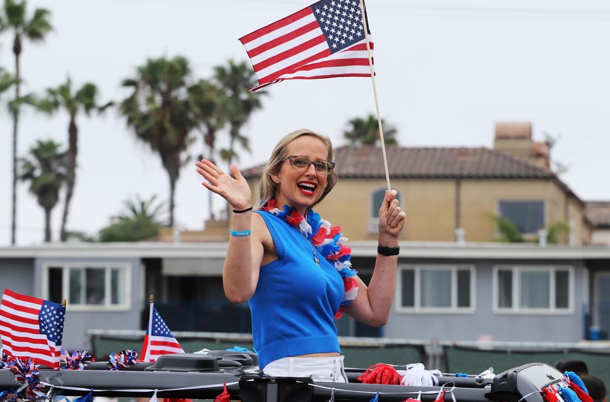 Huntington Beach's City Council member Natalie Moser, shown in this year's Fourth of July parade.