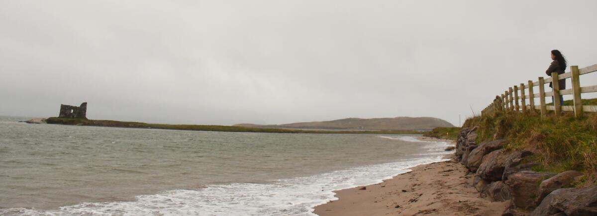 The coast and ruin near Ballinskelligs, Iveragh Peninsula, County Kerry, Ireland. Close at hand stands a chocolate factory.