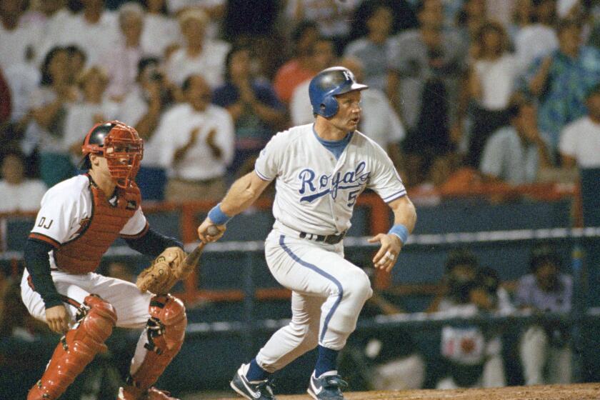 Kansas City Royals slugger George Brett looks at his 3,000th hit sail away during the seventh inning against the California Angels at Anaheim, Calif., Oct. 1, 1992. Brett, four shy of 3,000, hit four straight hits to reach the mark. (AP Photo/Mark J. Terrill)