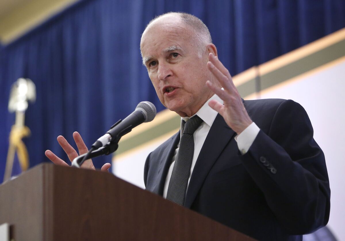 Gov. Jerry Brown told county officials that the state needs to reduce their funding to care for poor, uninsured Californians because the money is needed to expand healthcare at the state level.