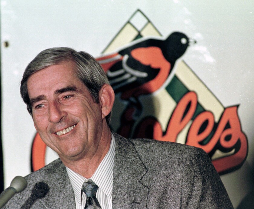 FILE - In this Tuesday, Nov. 11, 1997 file photo, Ray Miller, the pitching coach for the Baltimore Orioles, smiles during a press conference at Camden Yards announcing him as the team's new manager in Baltimore. Former Minnesota Twins and Baltimore Orioles manager Ray Miller, who spent 42 seasons in professional baseball and served as the pitching coach for three Cy Young award winners, has died, Tuesday, May 4, 2021. He was 76.(AP Photo/Roberto Borea, File)