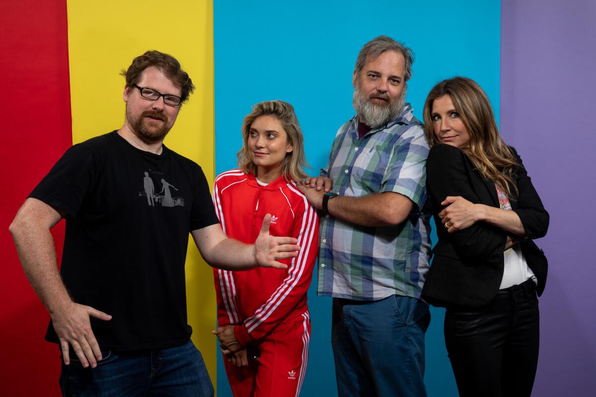 "Rick and Morty" showrunner Dan Harmon, second from right, with actors Justin Roiland, left, Spencer Grammer and Sarah Chalke, photographed at the L.A. Times Photo and Video Studio at Comic-Con International 2019, in San Diego.