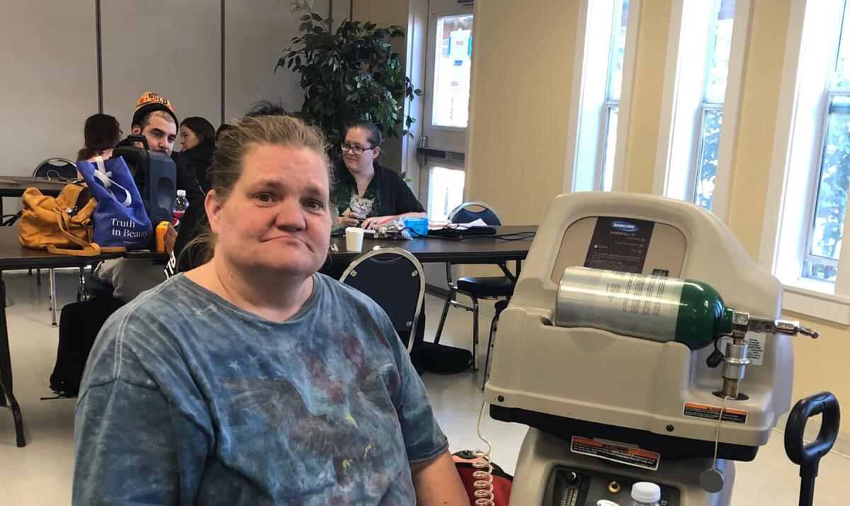 Liz Taft walked a half-mile pushing her brother-in-law’s oxygen machine to recharge it for him at a senior center after PG&E cut power in Lake County.