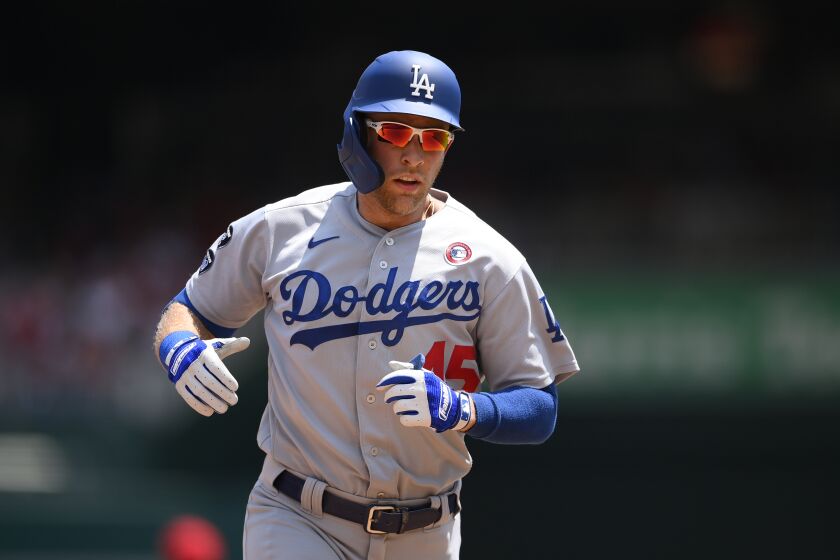 Los Angeles Dodgers' Matt Beaty rounds the bases on his home run during a baseball game against the Washington Nationals, Sunday, July 4, 2021, in Washington. The Dodgers won 5-1. (AP Photo/Nick Wass)
