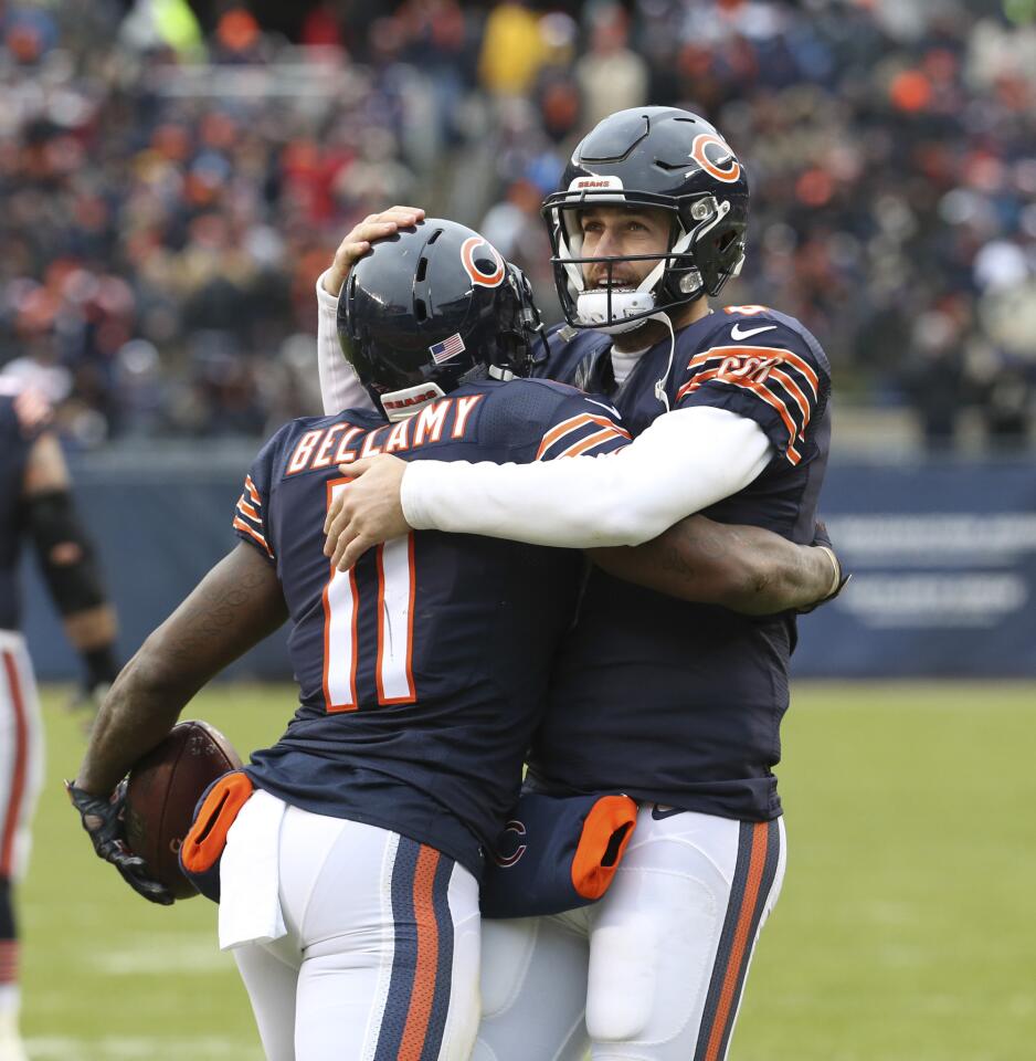 Josh Bellamy celebrates with Jay Cutler after his touchdown against the Lions during the second half.