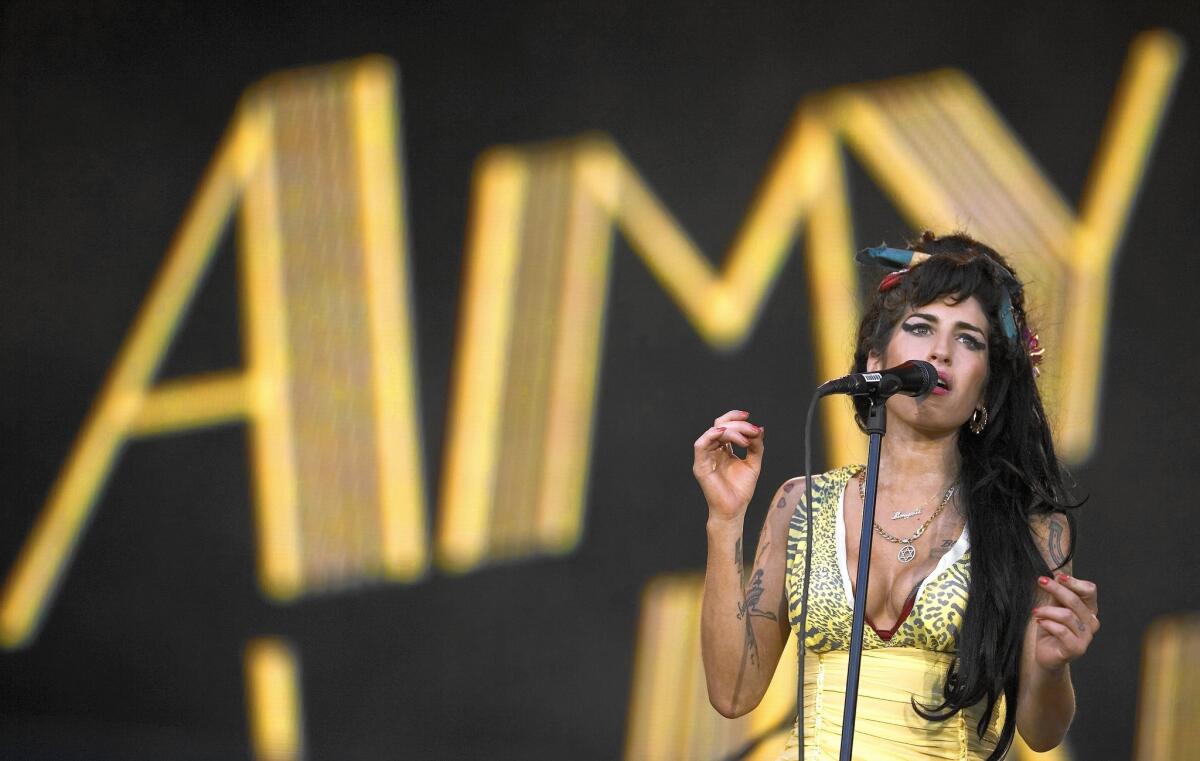 Amy Winehouse performs during the Rock in Rio music festival in Arganda del Rey on the outskirts of Madrid on July 4, 2008.