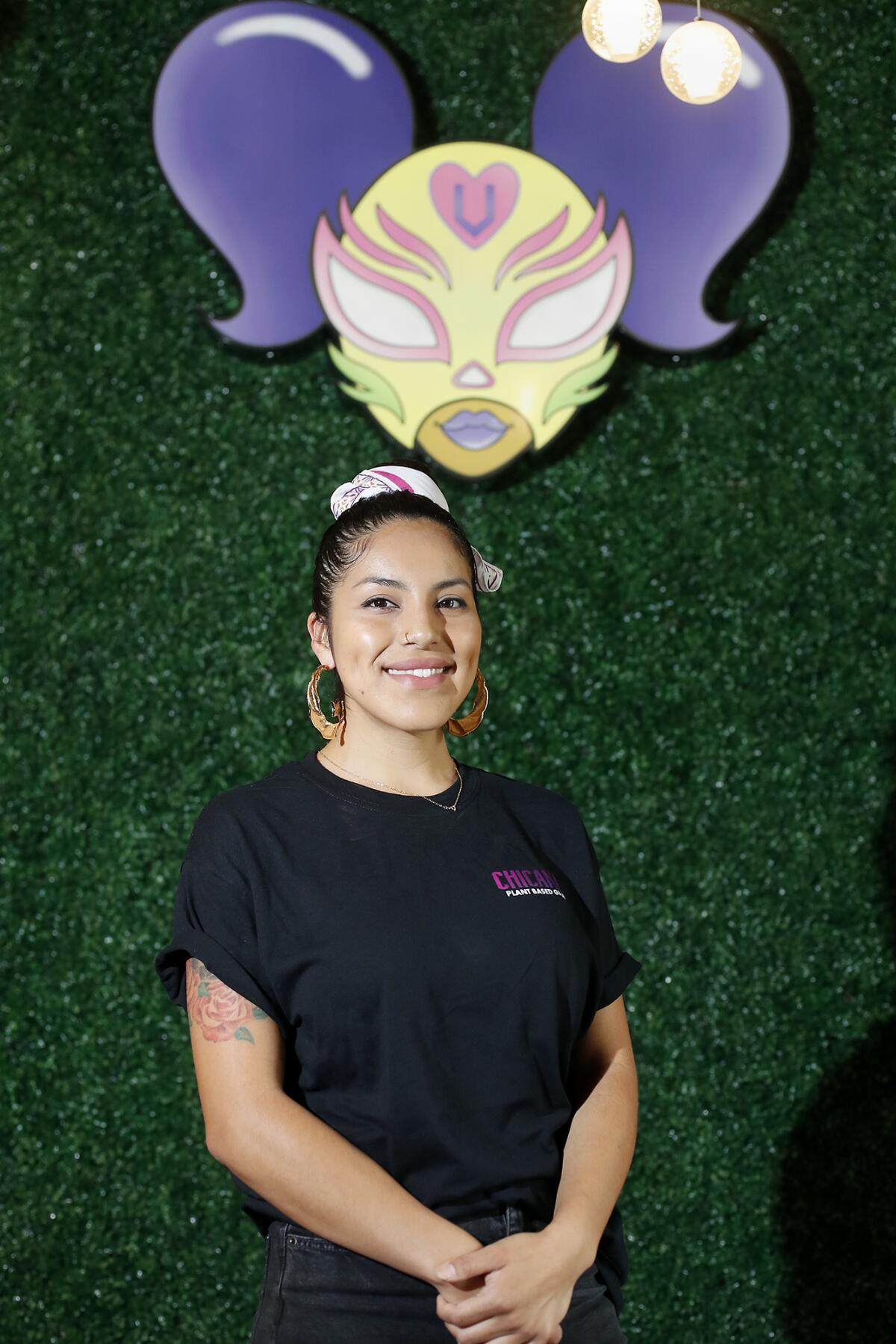 Jasmine Hernandez stands inside her soon-to-open Chicana Vegana in Fullerton.