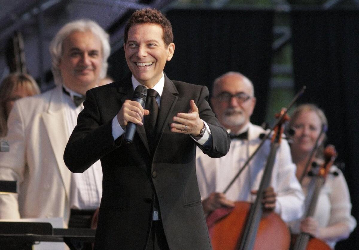 Michael Feinstein with members of the Pasadena Pops Orchestra in June at the L.A. County Arboretum.