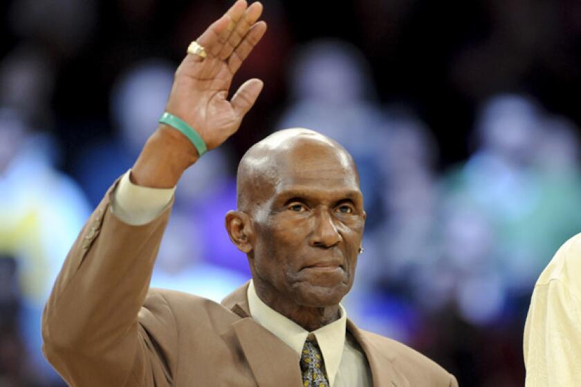 Flynn Robinson is honored along with other members of the Lakers' 1972 NBA championship team.