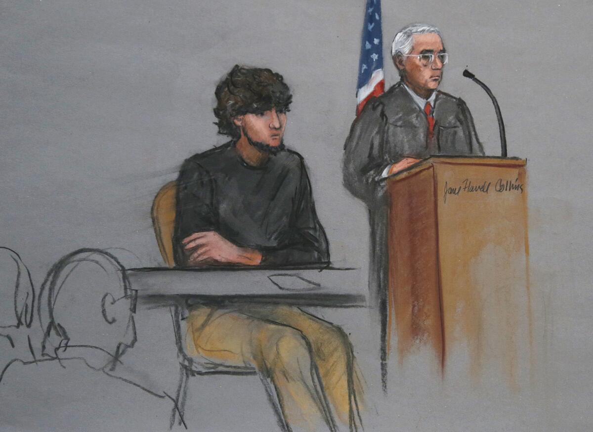 Boston Marathon bombing suspect Dzhokhar Tsarnaev is depicted in court in Boston with U.S. District Judge George O'Toole Jr.