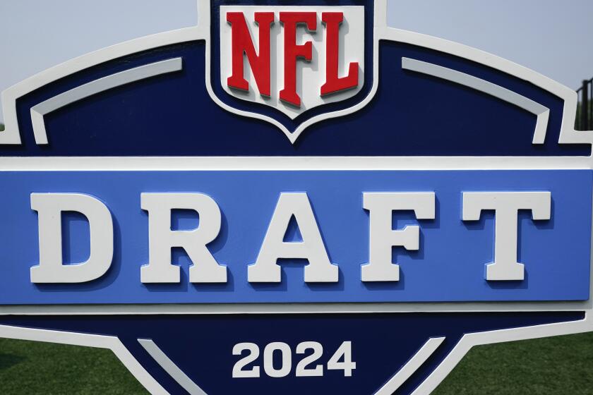 A 2024 NFL draft sign is shown at a Detroit Lions NFL football practice in Allen Park, Mich., Tuesday, July 25, 2023. The 2024 draft will be held in Detroit, April 25–27. (AP Photo/Paul Sancya)