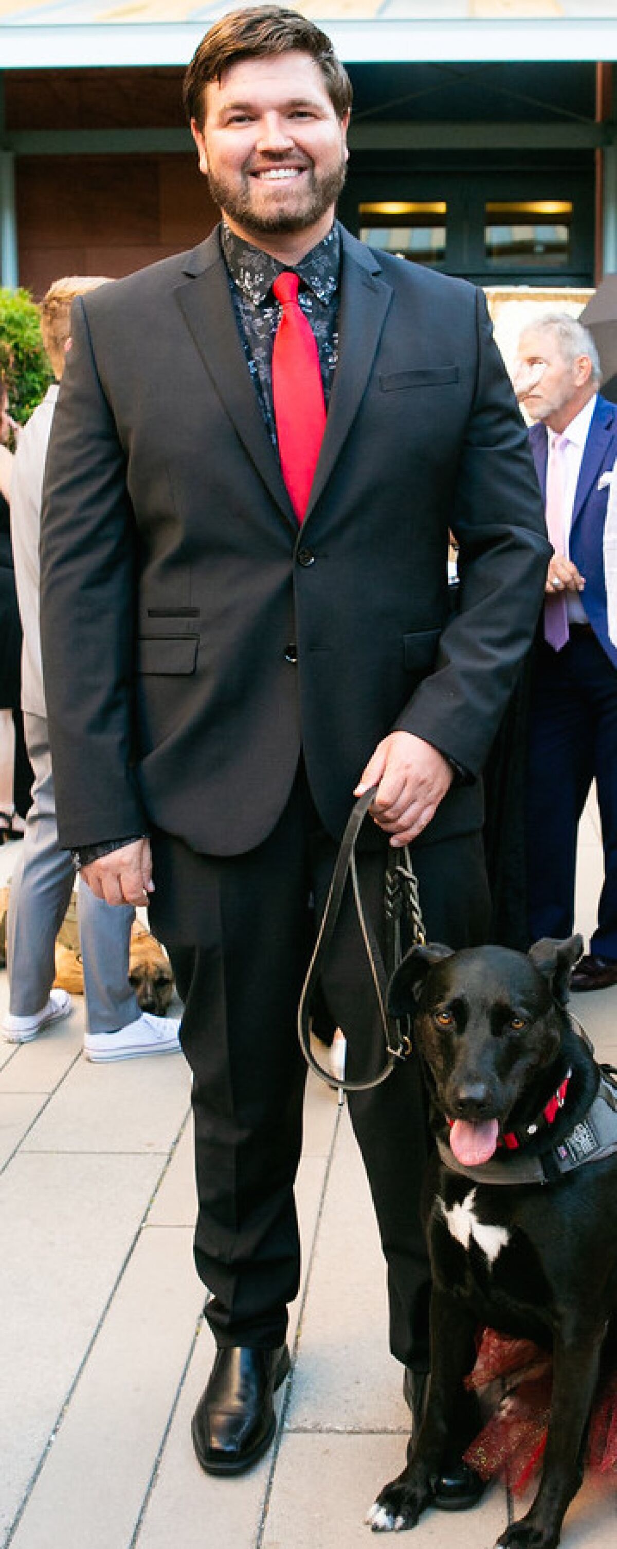 Aaron Neely, USN, and Liberty, STS service dog