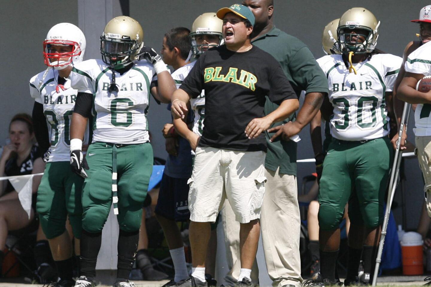 Blair's head coach Johnny Lopez yells at his team during a game against Pasadena Poly at Pasadena Poly on Saturday, September 8, 2012.