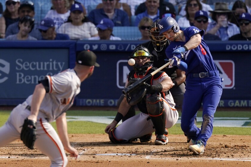 Trea Turner of the Dodgers hits a solo home run off San Francisco Giants starting pitcher Alex Wood.