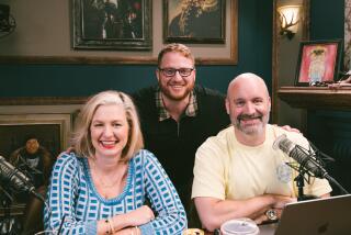 Christina P and Tom Segura with ____ (center) on the set of at Your Mom's House