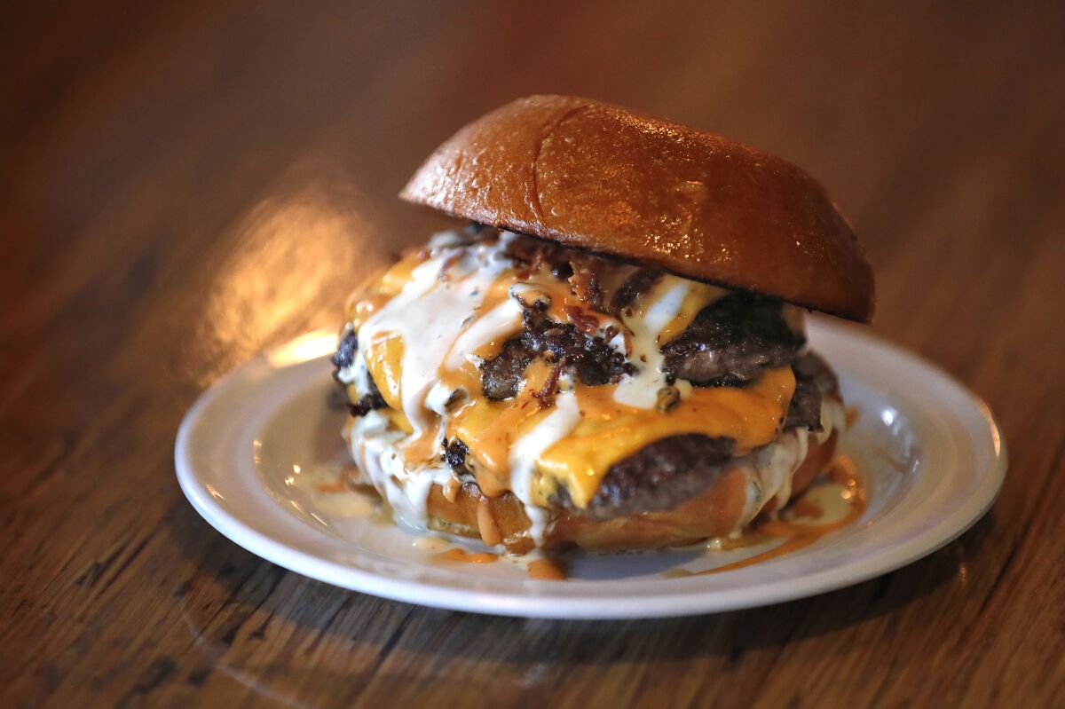When a guest donates to the 86 Restaurant Struggle, they can get the half-pound Community Cheeseburger.