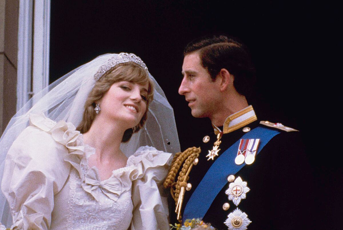 Prince Charles and his bride Diana, Princess of Wales, on their wedding day at Buckingham Palace