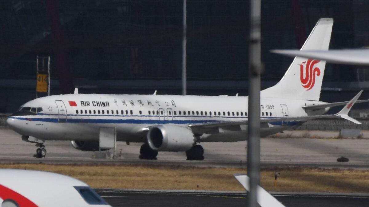 China, Indonesia and Ethiopia have grounded the Boeing 737 Max 8 after Sunday's fatal crash. Above, an Air China Boeing 737 Max 8 plane at Beijing Capital Airport.