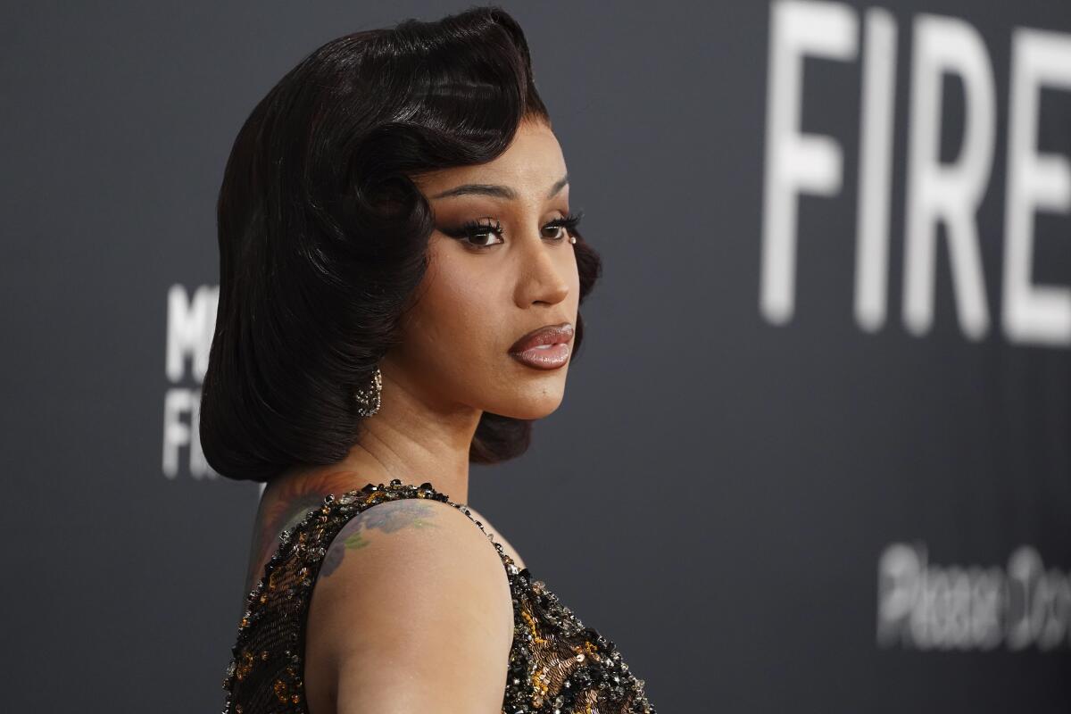 Cardi B is sued for assault and battery over mic-throw incident - Los Angeles Times