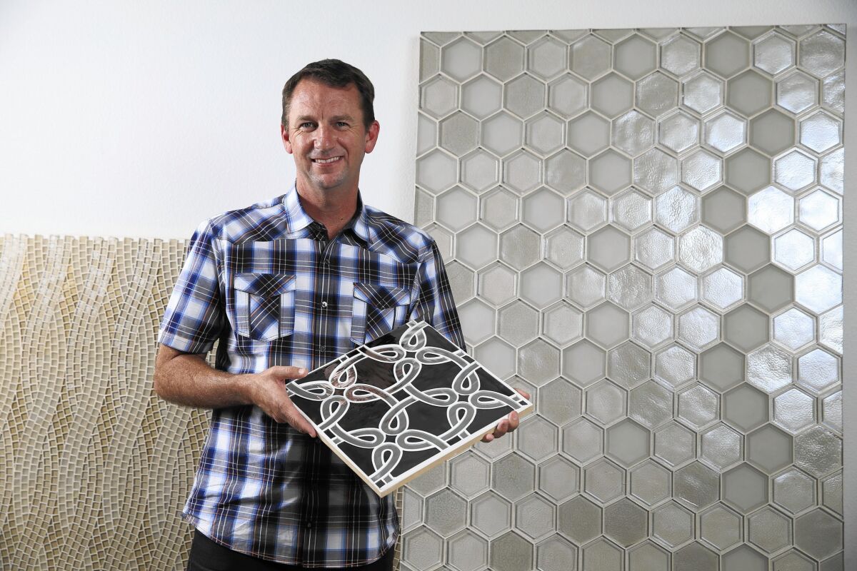 Oceanside Glasstile uses large amounts of recycled glass to make tiles for kitchens, baths, swimming pools and fireplaces. A Tijuana factory employs 290 people, and an additional 40 workers are at company headquarters in Carlsbad. Above, the company's president, Sean Gildea.