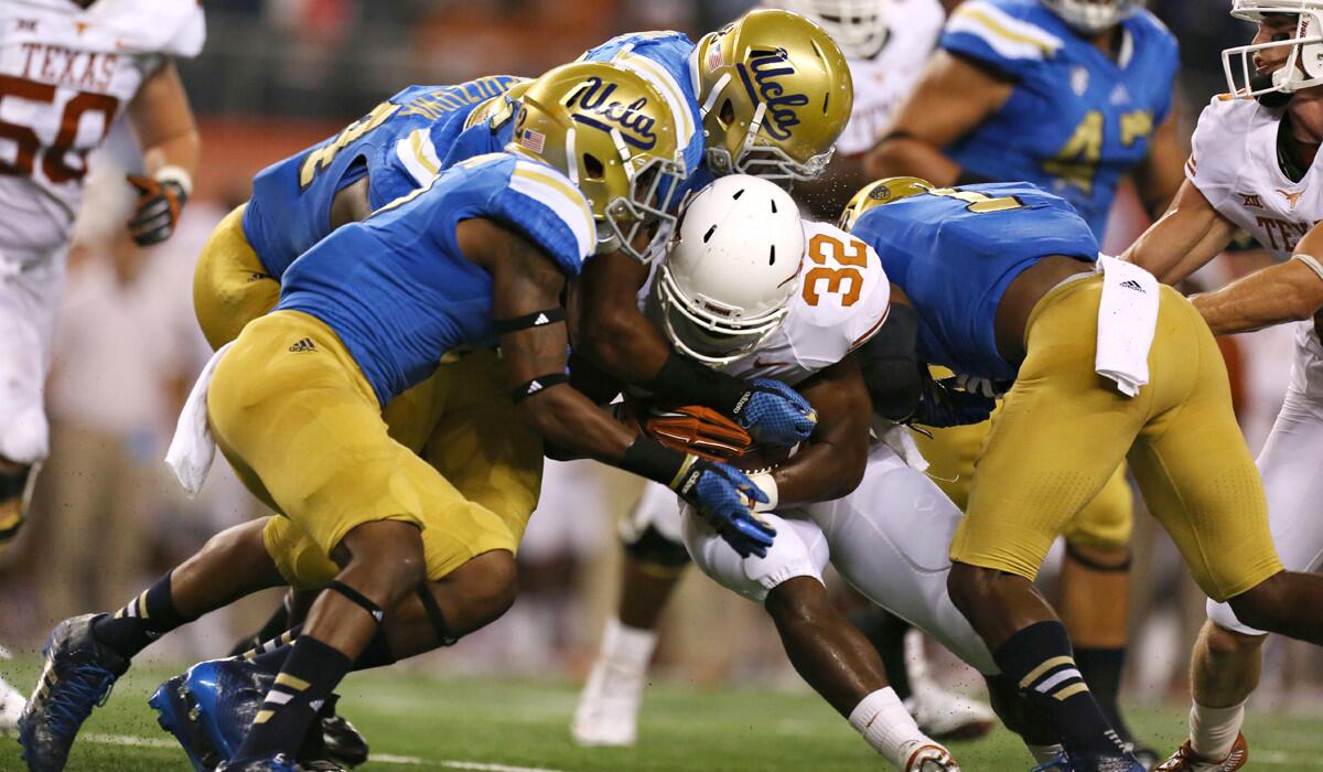 Although the UCLA defense stuffed Texas running back Johnathan Gray on this play, the Bruins' coaching staff sees plenty of room for improvement.