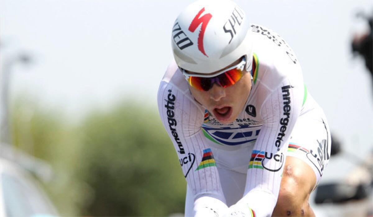 Tony Martin of Germany won stage 11 of the Tour de France, posting a time of 36:29 in the 33-kilometer individual time-trial on Wednesday.