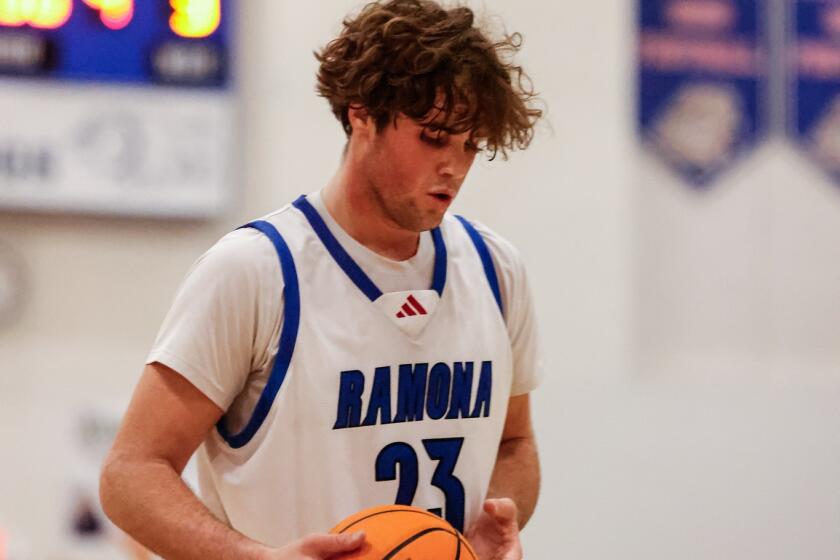 Ramona High sophomore Lucas Winkler, a forward, is one of four players returning to the Bulldogs basketball team this season.