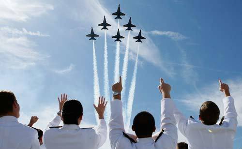 The U.S. Navy Blue Angels aerobatic team flies over the United States Naval Academy graduation and commissioning ceremony at the Navy-Marine Corps Memorial Stadium today in Annapolis, Md. President Obama delivered the commencement address to the 1,036 graduates of the class of 2009.
