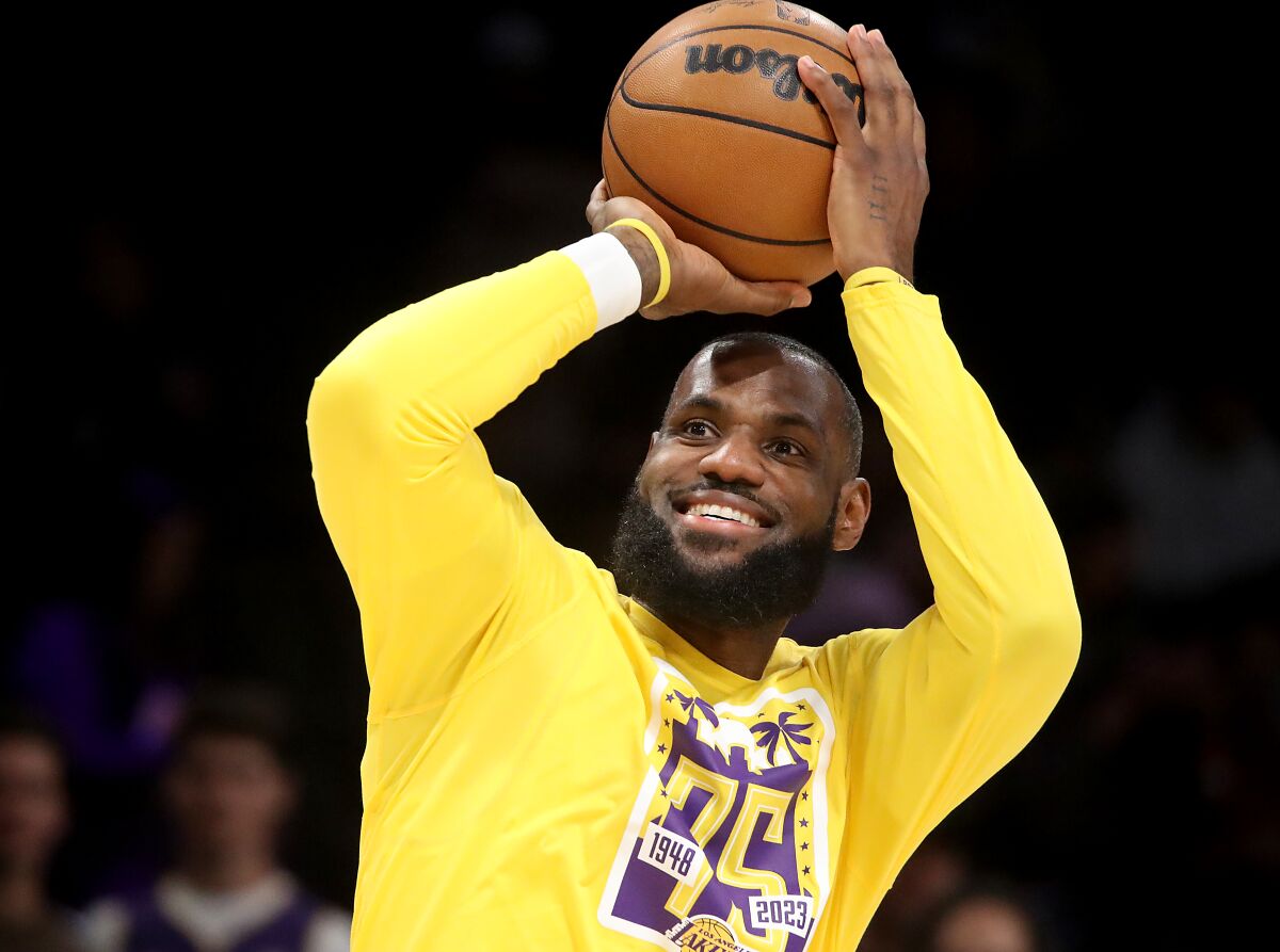 Lakers star LeBron James warms up before a game against the Portland Trail Blazers on Nov. 30.