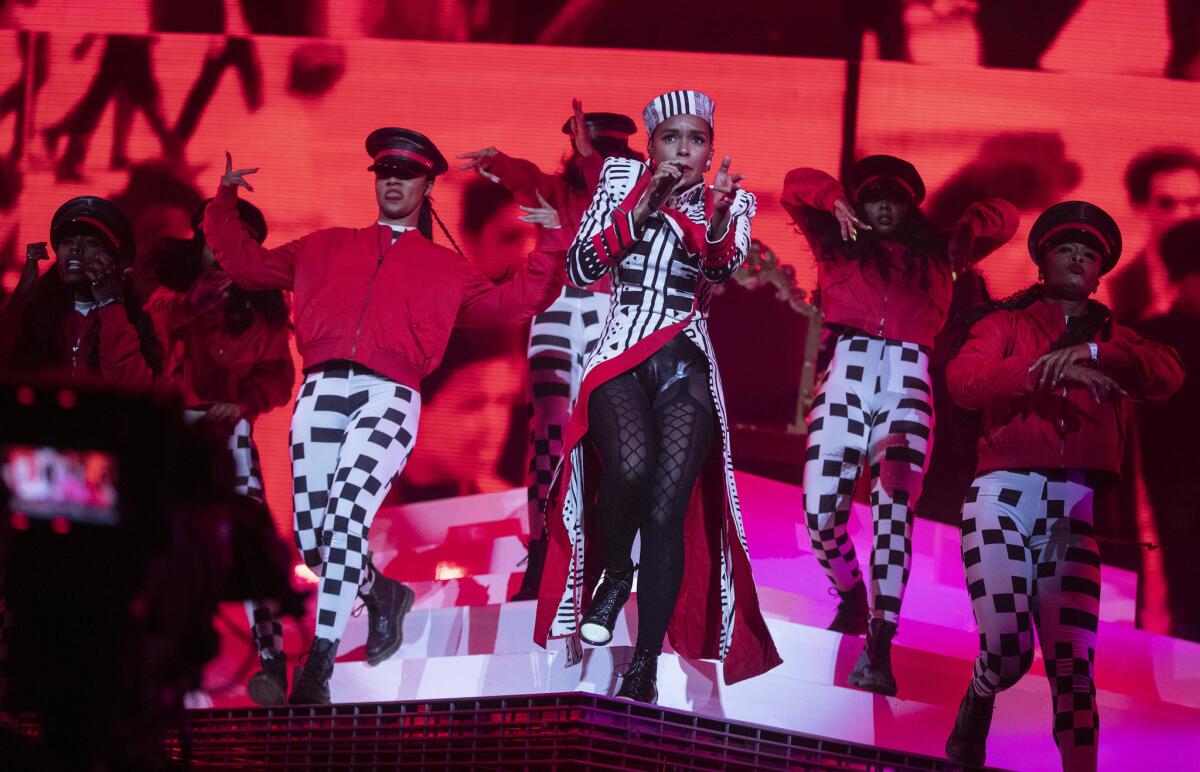 Janelle Monáe performs on the Coachella stage with a group of dancers at the Coachella Valley Music and Arts Festival on April 12.
