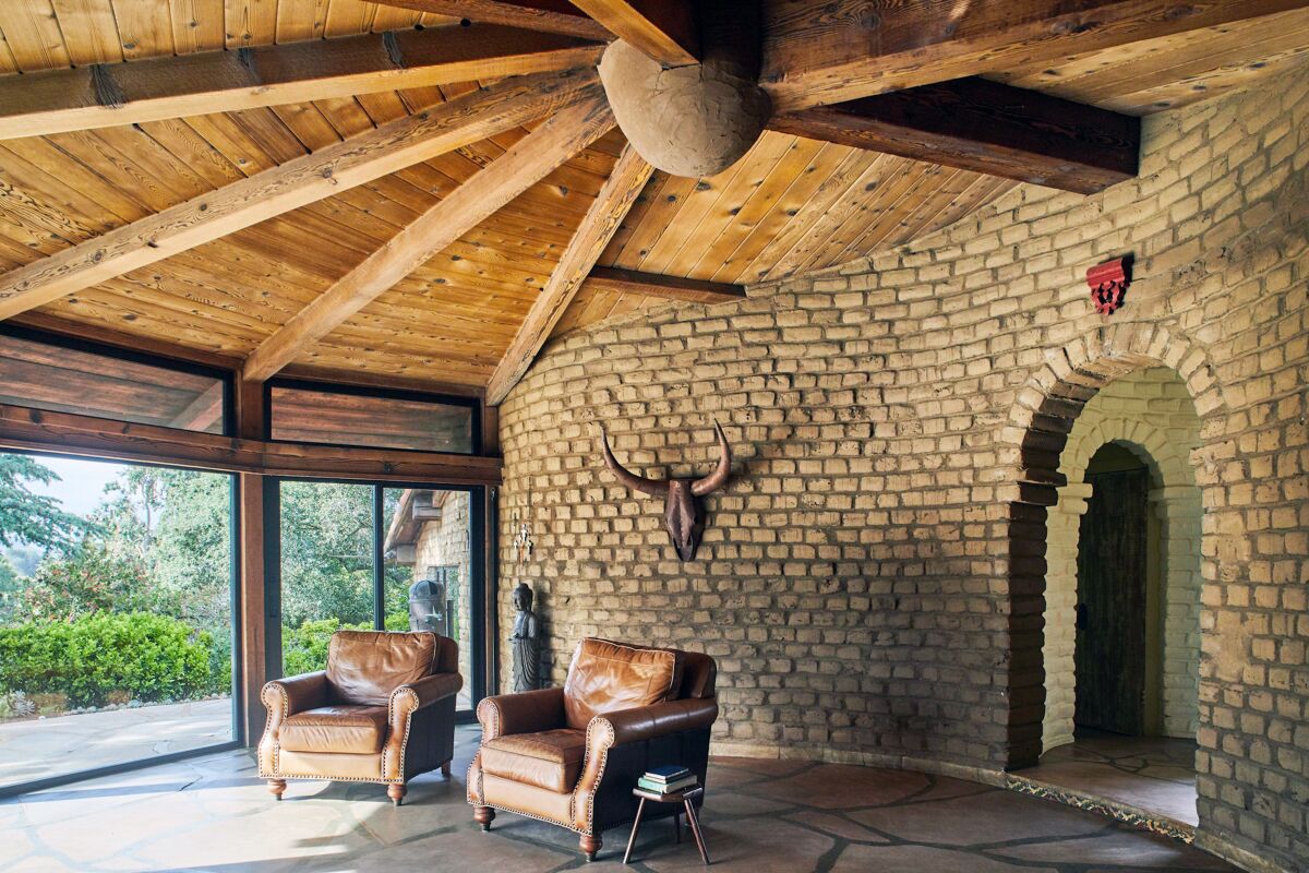 KAUFMAN ADOBE: Round ceilings and curved walls in this 1958 Escondido home are signatures of Larry Weir’s designs.