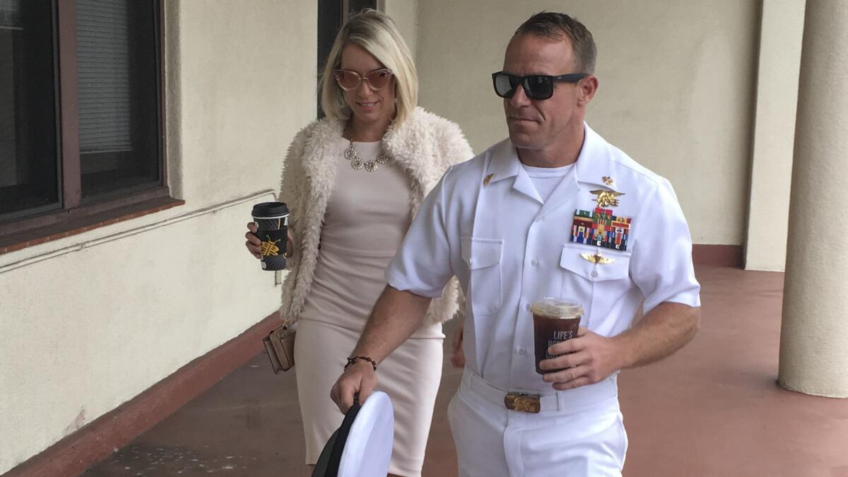 Navy Special Operations Chief Edward Gallagher and his wife, Andrea, arrive to military court Monday on Naval Base San Diego.