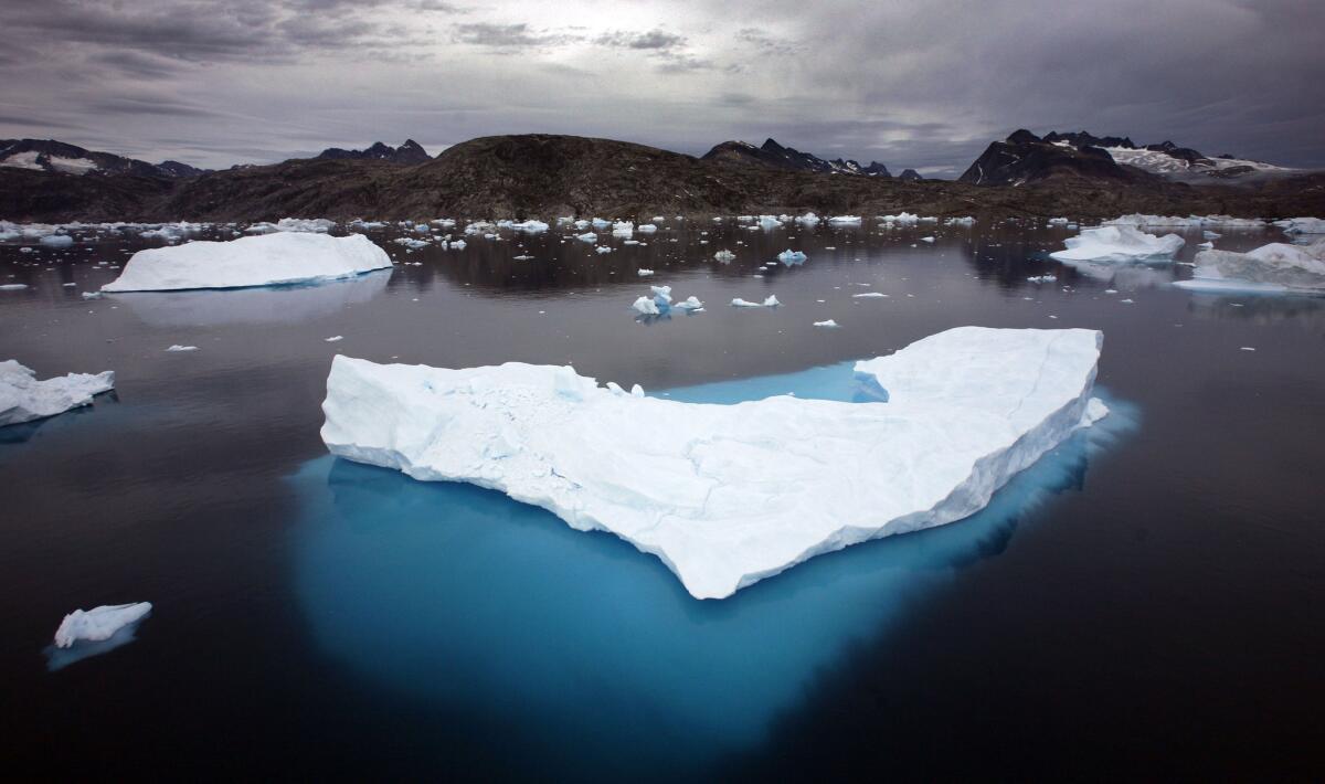 Icebergs float in a bay off Ammassalik Island, Greenland.