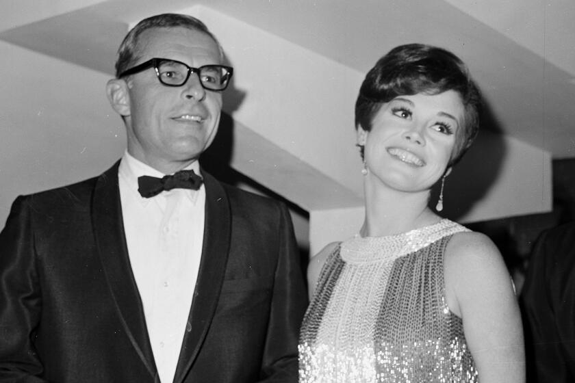 Grant Tinker and Mary Tyler Moore. (Earl Leaf/Getty Images)