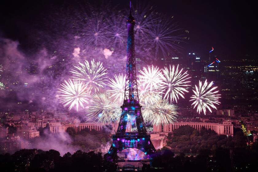 Mandatory Credit: Photo by JULIEN DE ROSA/EPA-EFE/REX/Shutterstock (9761899c) Fireworks illuminate the sky near the Eiffel Tower in a photo taken from the Montparnasse Tower Observation Deck, as part of the Bastille Day celebrations in Paris, France, 14 July 2018. Bastille Day, the French National Day, is held annually on 14 July to commemorate the storming of the Bastille fortress in 1789. Paris Bastille Day fireworks, France - 14 Jul 2018 ** Usable by LA, CT and MoD ONLY **