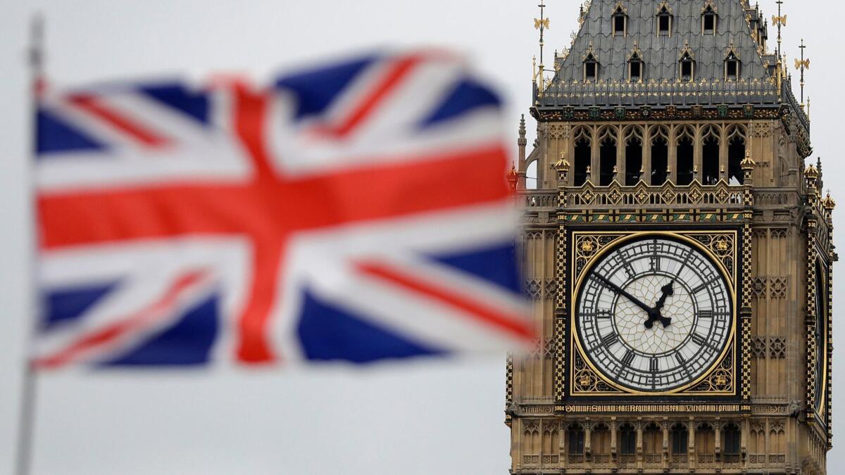 The British Union flag waves in front of Big Ben in central London on March 29, 2017.