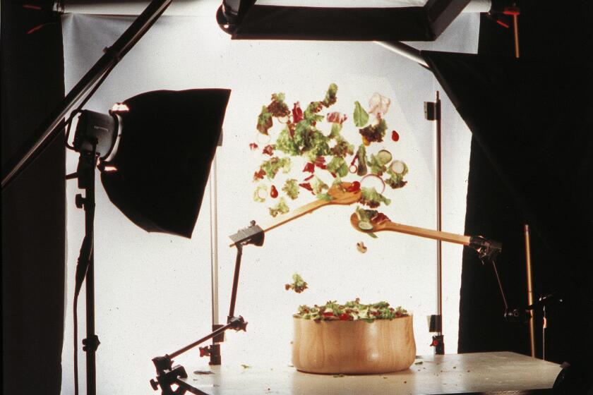 Photo shoot for tossing a salad.
