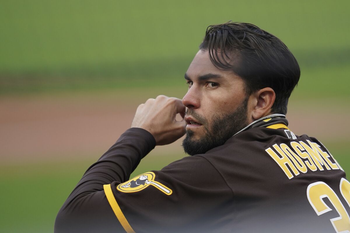 Padres first baseman Eric Hosmer watches from the dugout during game against the Giants last week.