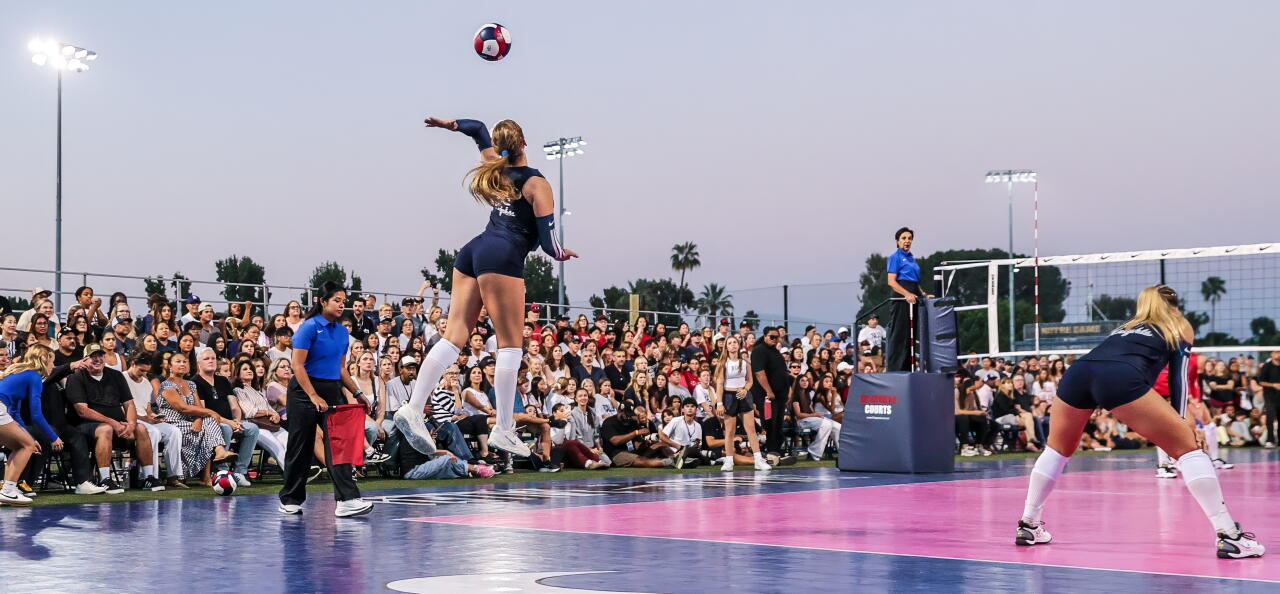 Over 1,000 fans gathered Saturday for an outdoor girls’ volleyball match at Sherman Oaks Notre Dame on the baseball field.