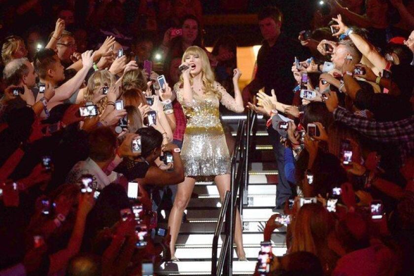 Taylor Swift performs at the iHeartRadio Music Festival at the MGM Grand Garden Arena in Las Vegas.