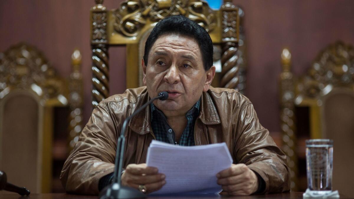 Constitutional Court head Francisco de Mata Vela leads a news conference in Guatemala City on Aug. 27, 2017.