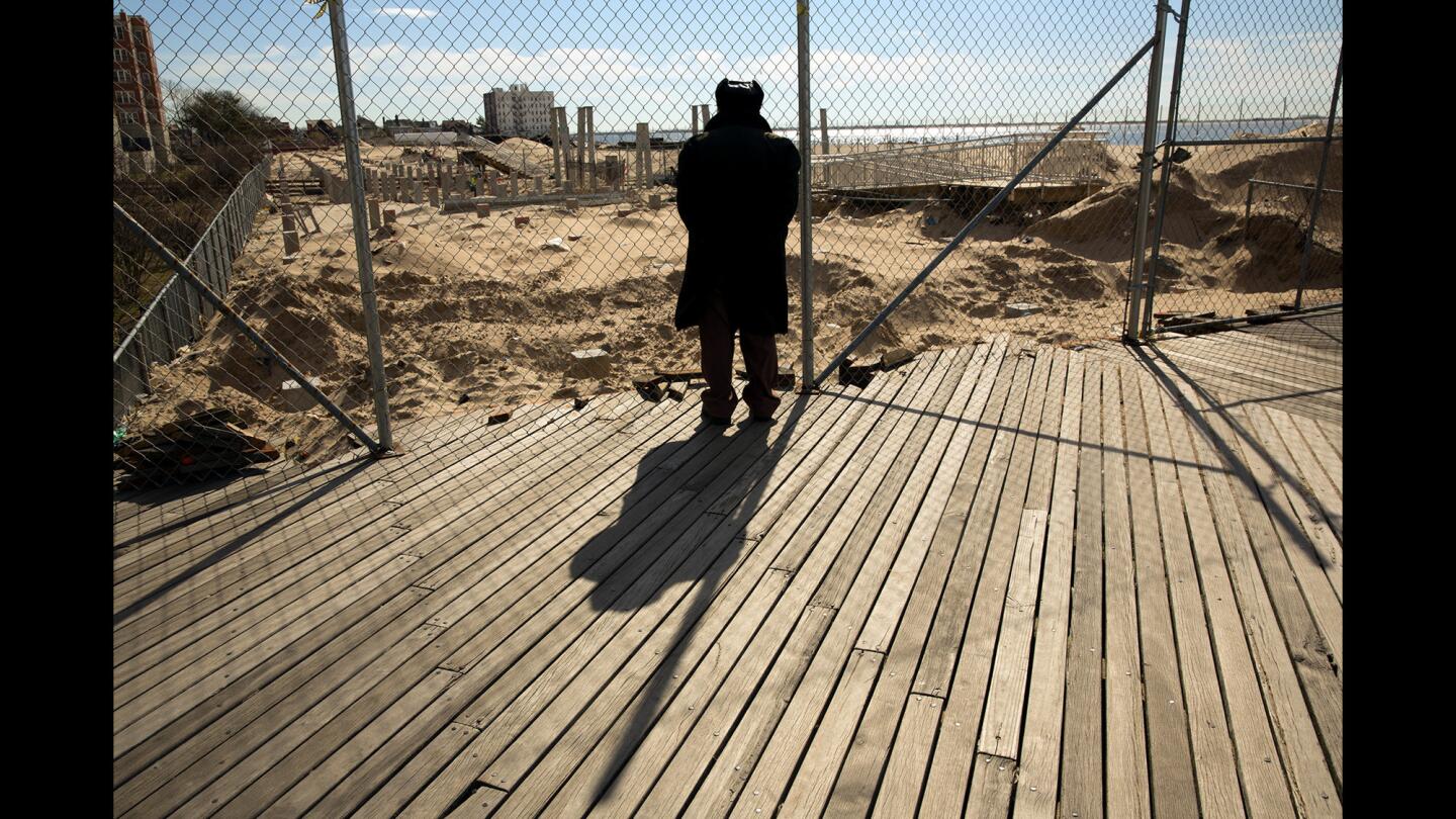 Abraham Chorekchen, 83, visits Coney Island daily to see the boardwalk work. "The old boardwalk gives some kind of relaxed mood on the beach,” he says. “Like having a backyard porch."